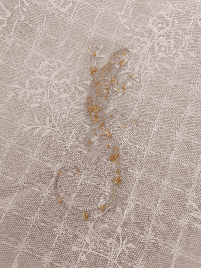 Lézard en feuilles d &#039;or